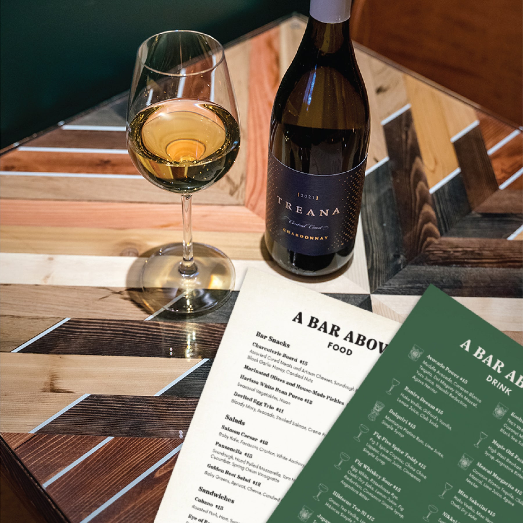 A Bar Above menu and wine glass.